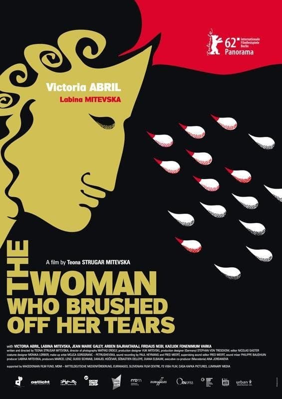 The Woman Who Brushed Off Her Tears photo